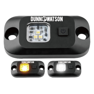 Black LED utility light with central bulb, power button; emits amber and white light variations.