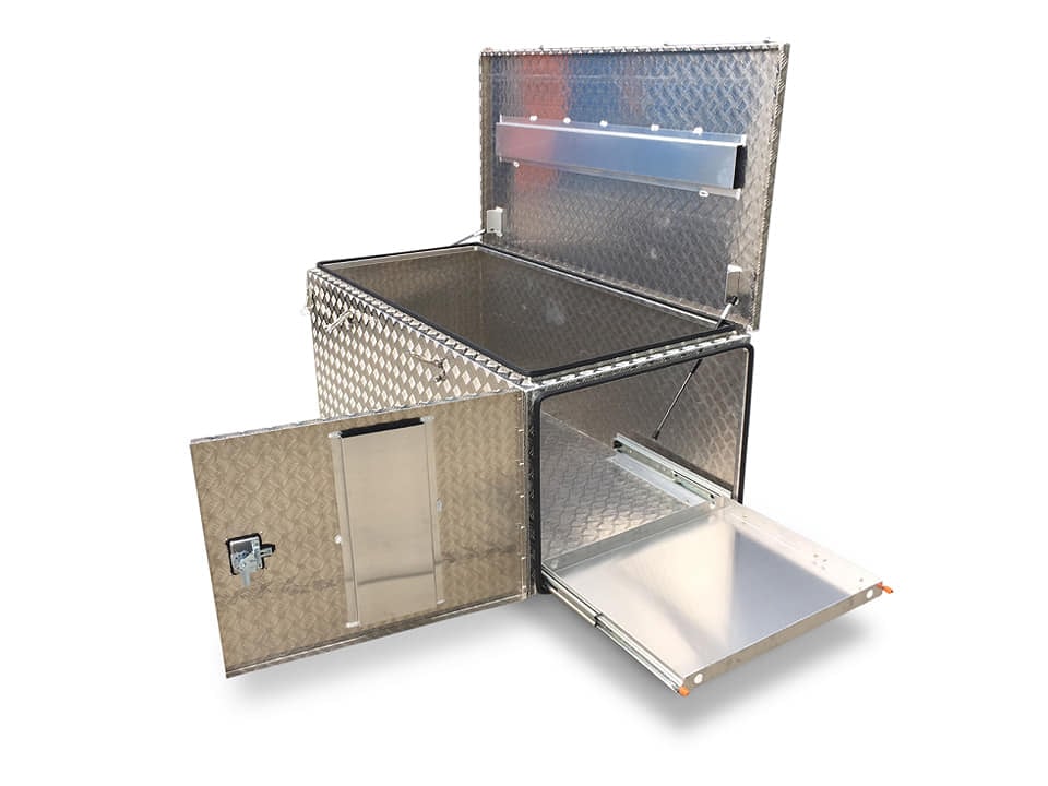 Open aluminum toolbox with diamond pattern, top and side compartments, latch, and handle.
