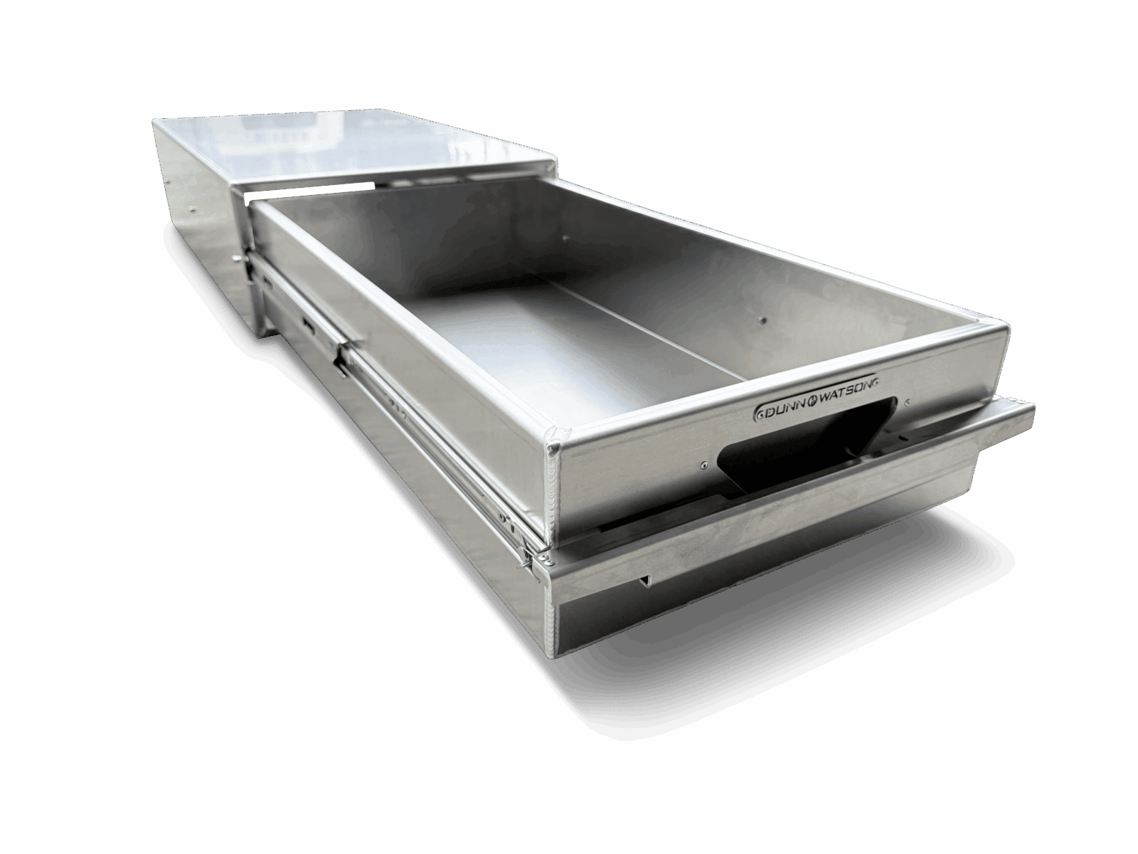 Stainless steel Dunn & Watson metal drawer fully extended on a black background.